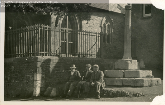 Picture of Three men sitting by the market cross